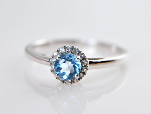 10K White Gold Blue Topaz Ring with CZ Accents Size 8