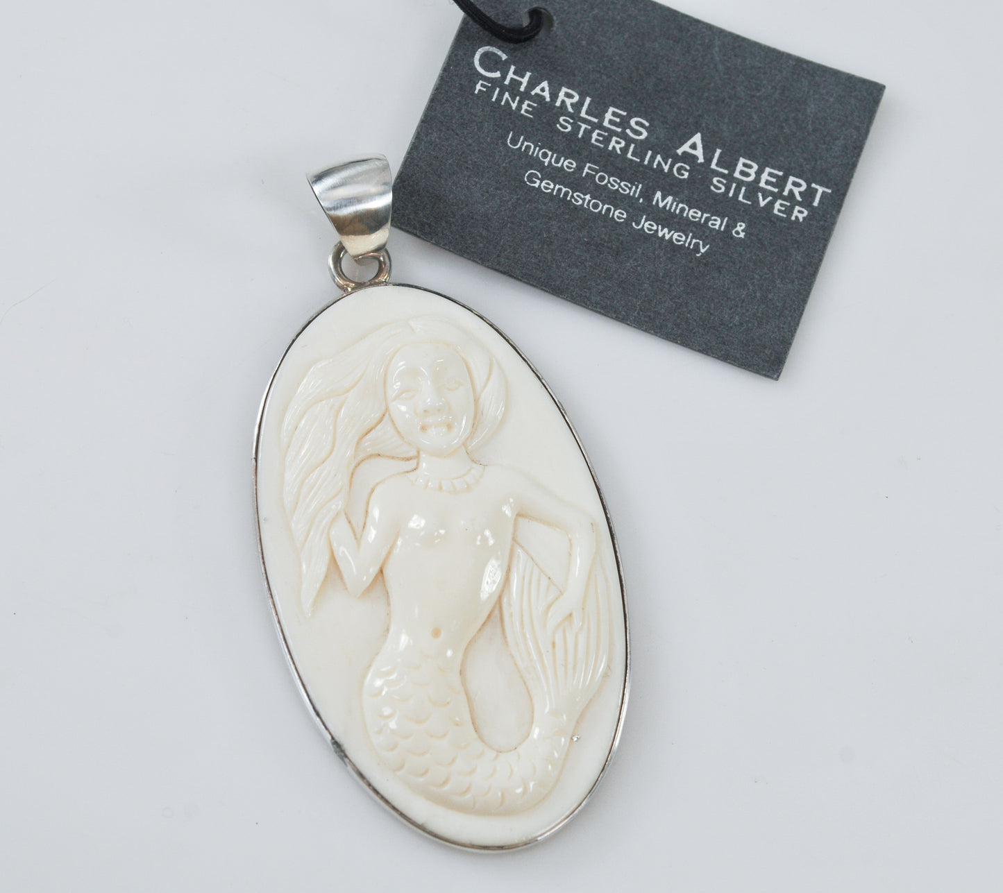 Charles Albert Fine Silver Carved Bone Mermaid Pendant