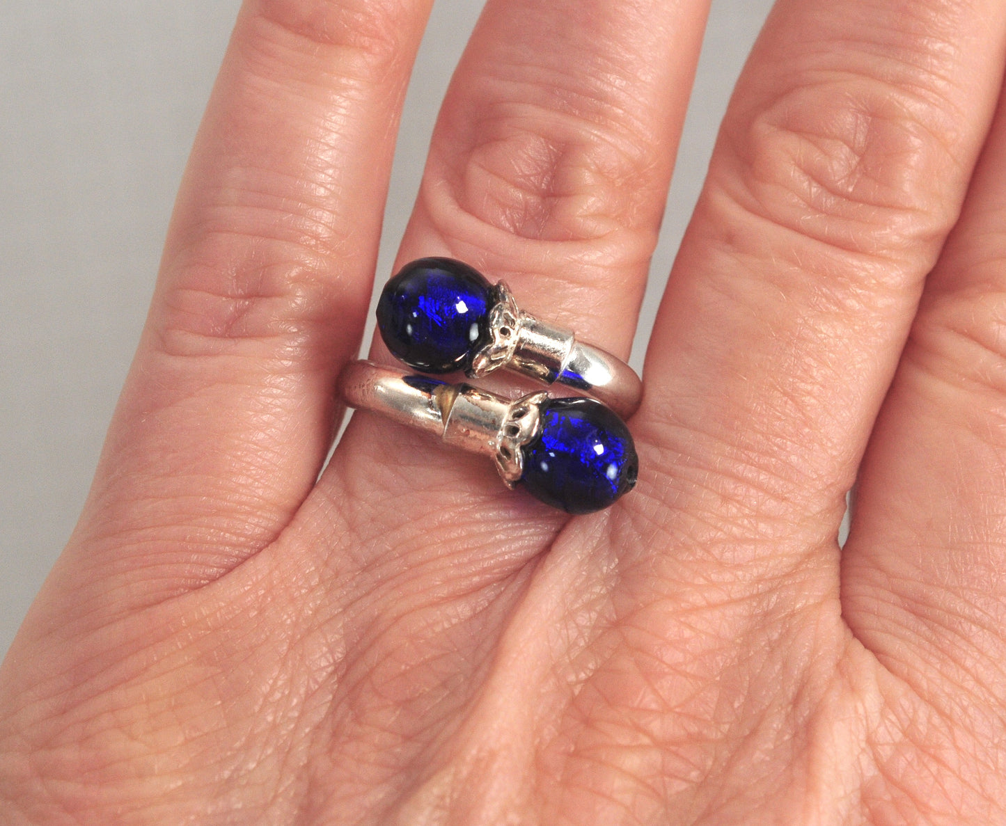 Signed Sterling Silver Blue Glass Bypass Ring
