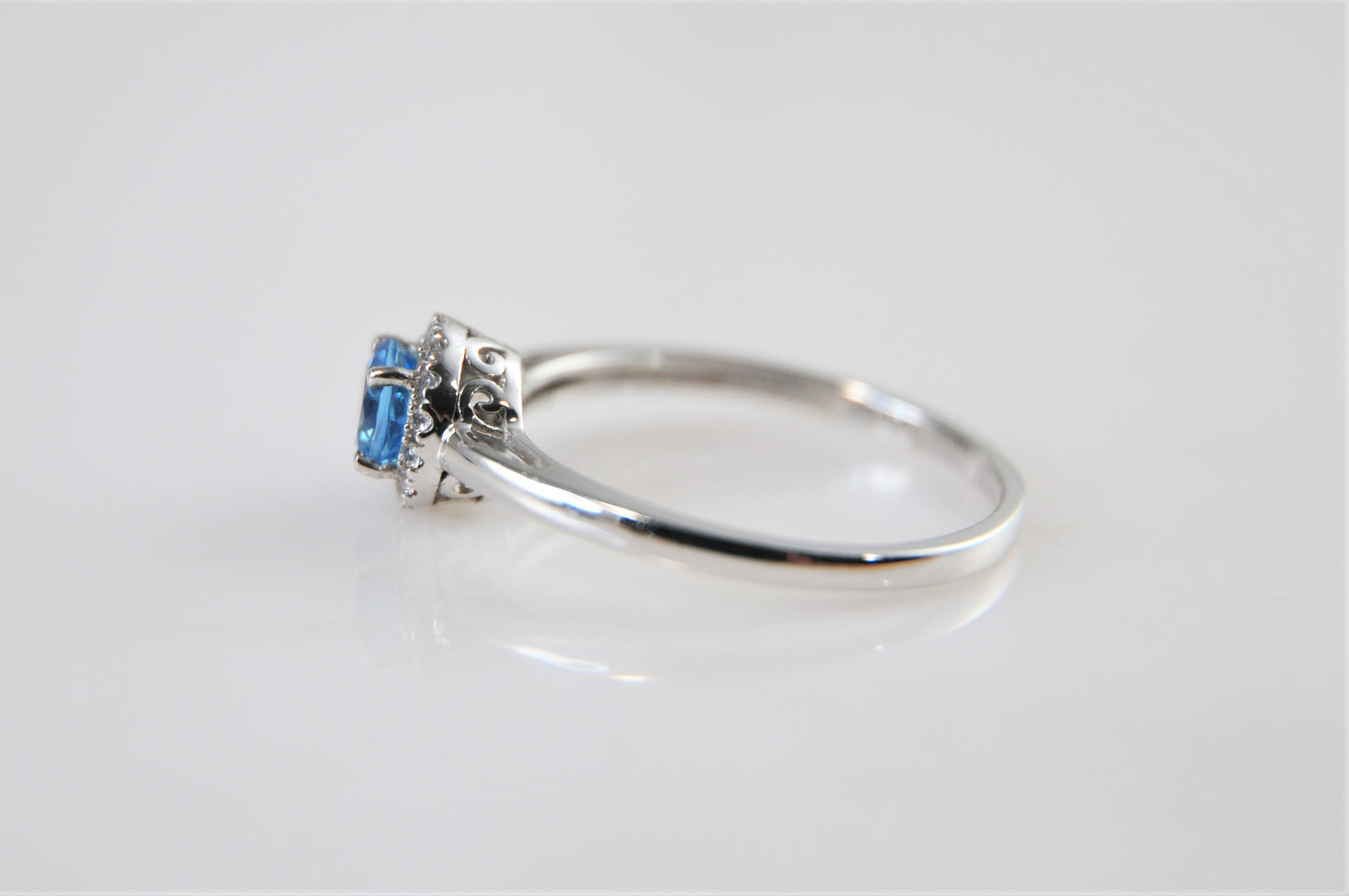 10K White Gold Blue Topaz Ring with CZ Accents Size 8