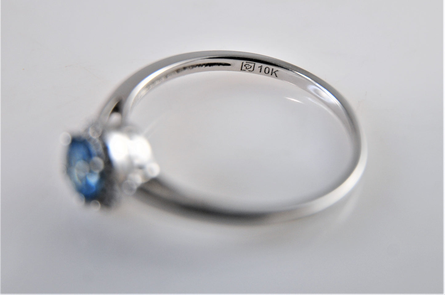 10K White Gold Blue Topaz Ring with CZ Accents Size 8