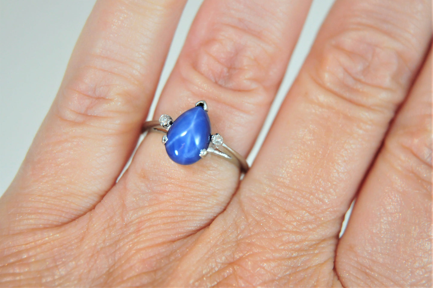 10K White Gold Blue Star Sapphire Ring with Diamond Accents