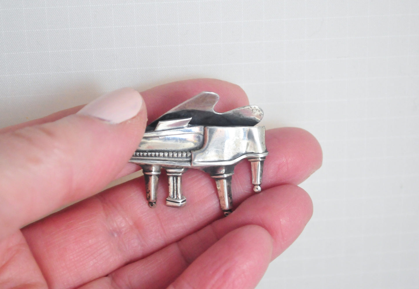 Beau Sterling Silver Piano Brooch