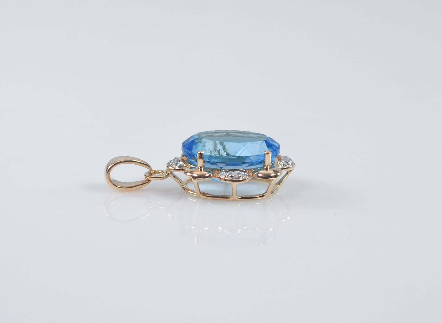 10K Gold Blue Topaz Pendant with Diamond Accents