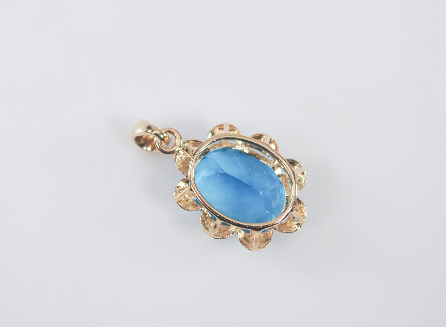 10K Gold Blue Topaz Pendant with Diamond Accents