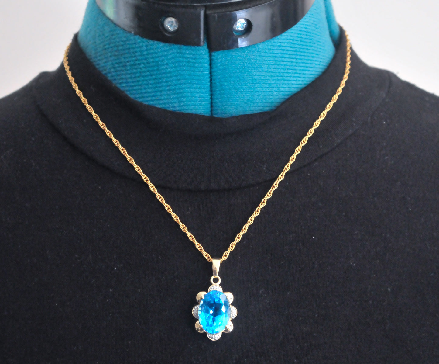 10K Gold Blue Topaz Pendant with Diamond Accents