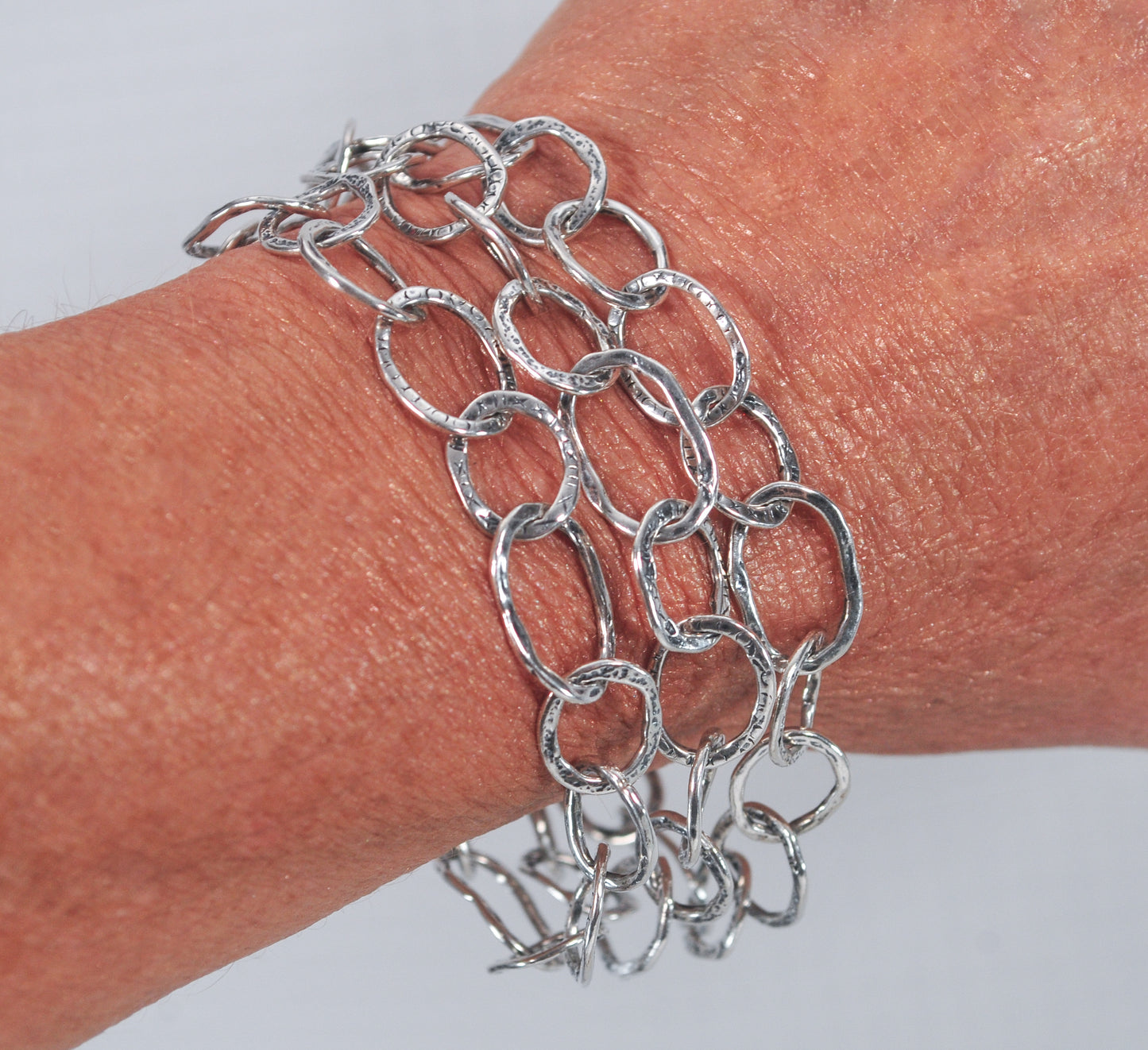 Opulenza Sterling Silver Hammered Bracelet