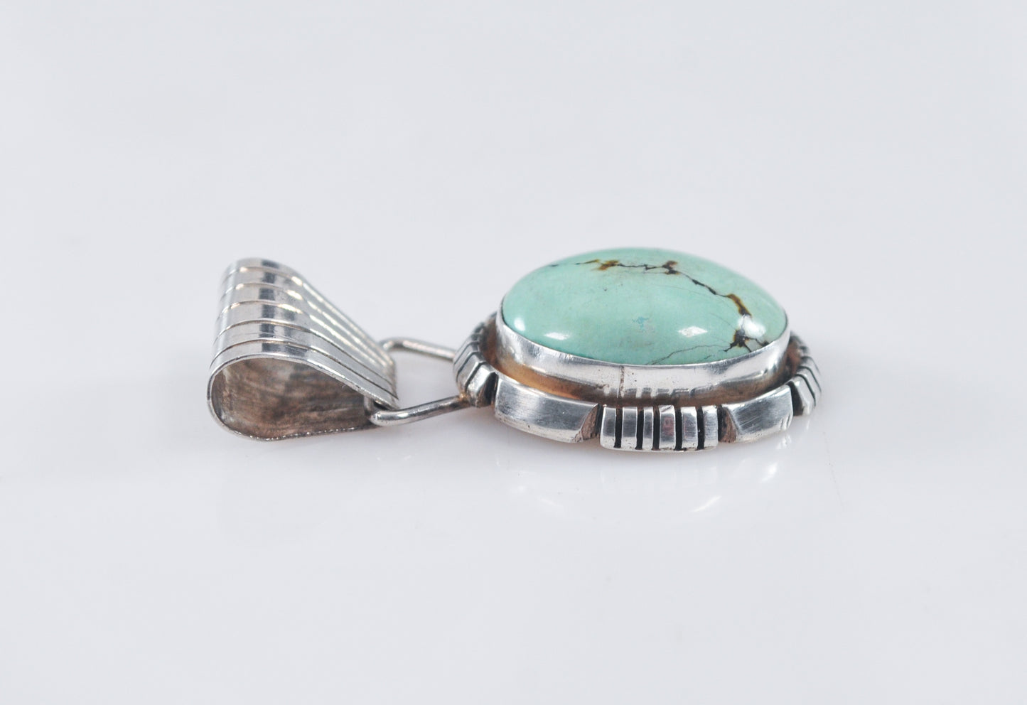 Signed Navajo Turquoise Sterling Silver Pendant