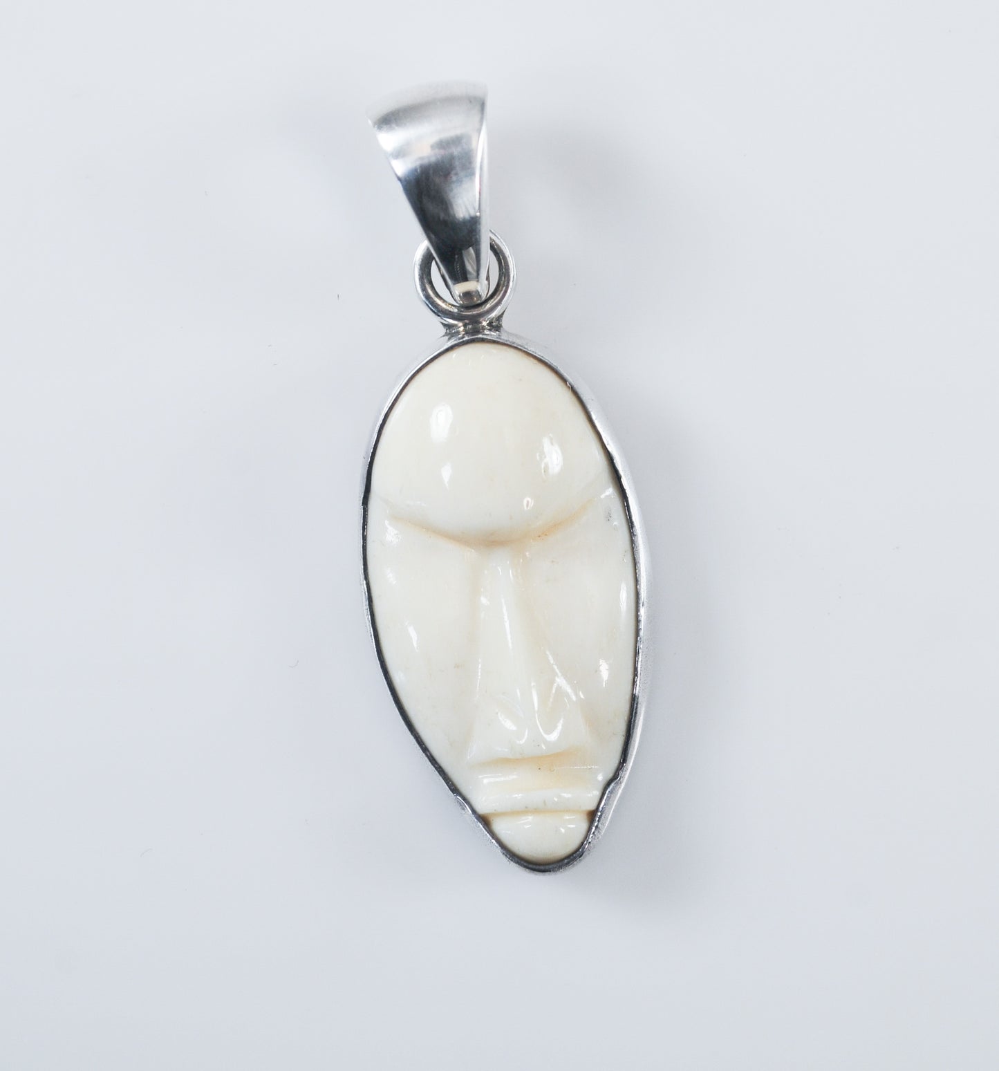 Charles Albert Sterling Silver Carved Bone Face Pendant