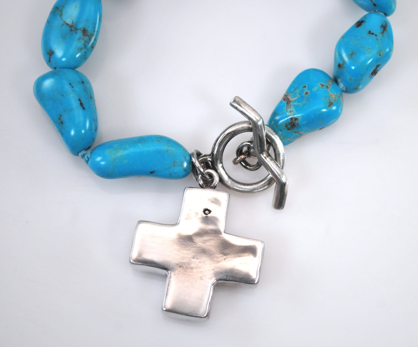 Sterling Silver Turquoise Nugget Cross Bracelet