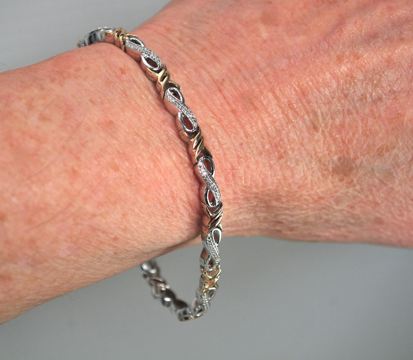 Sterling Silver 10K Gold Diamond Infinity Bracelet
