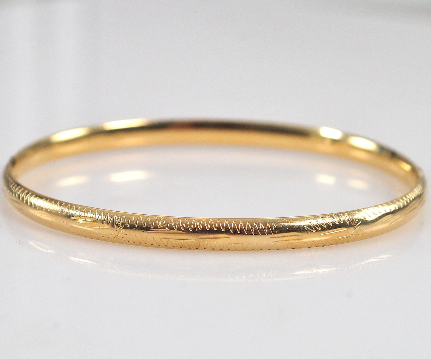 Narrow 14K Gold Bangle Bracelet