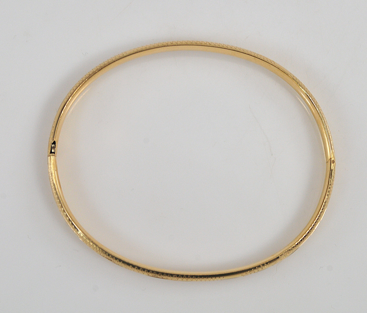 Narrow 14K Gold Bangle Bracelet