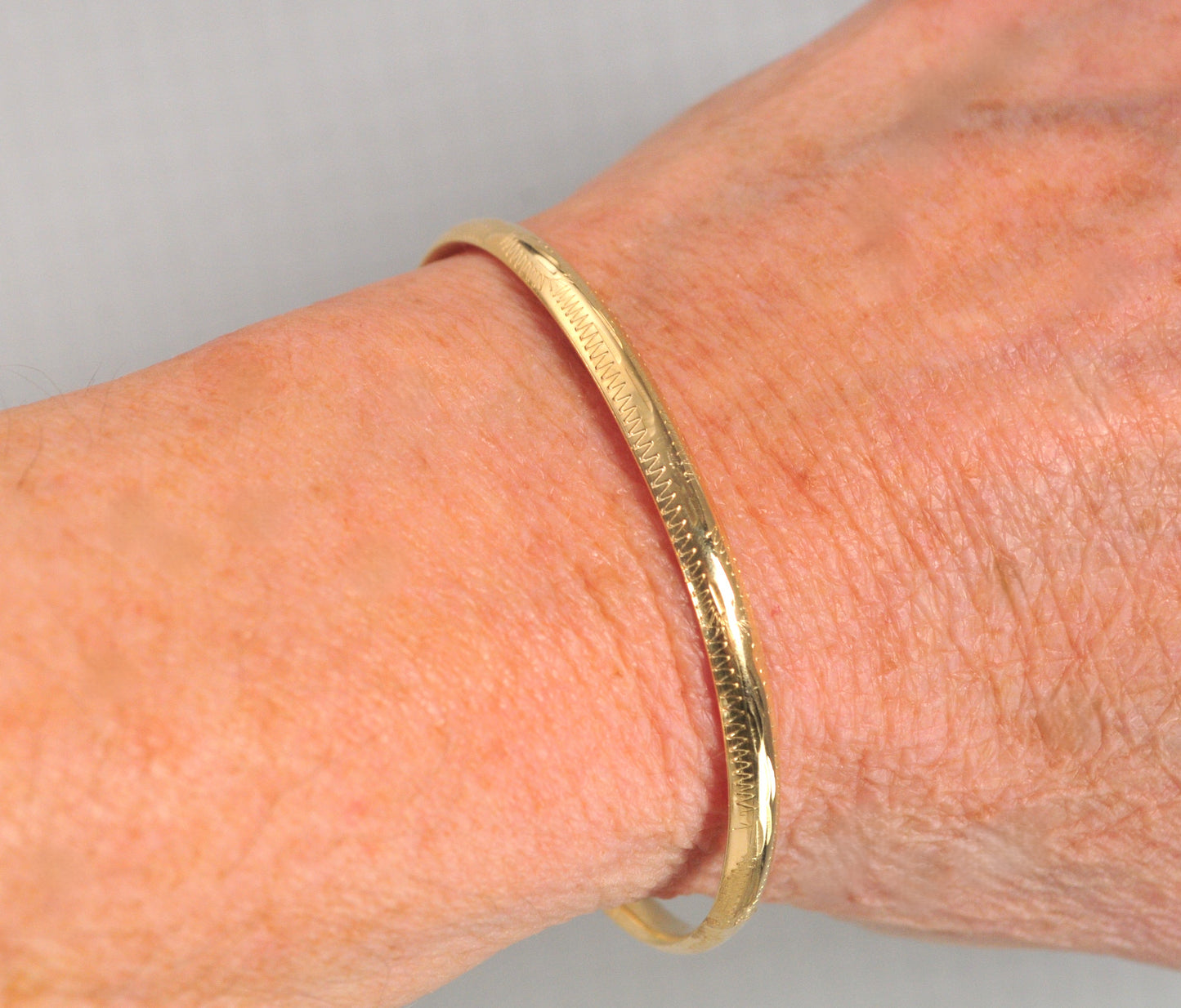 Narrow 14K Gold Bangle Bracelet