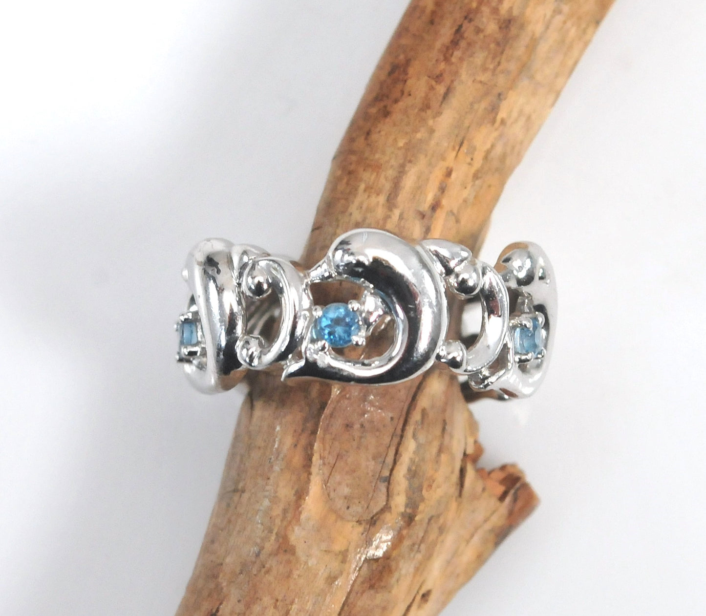 Concorde Collection Sterling Silver Blue Topaz Dolphin Ring