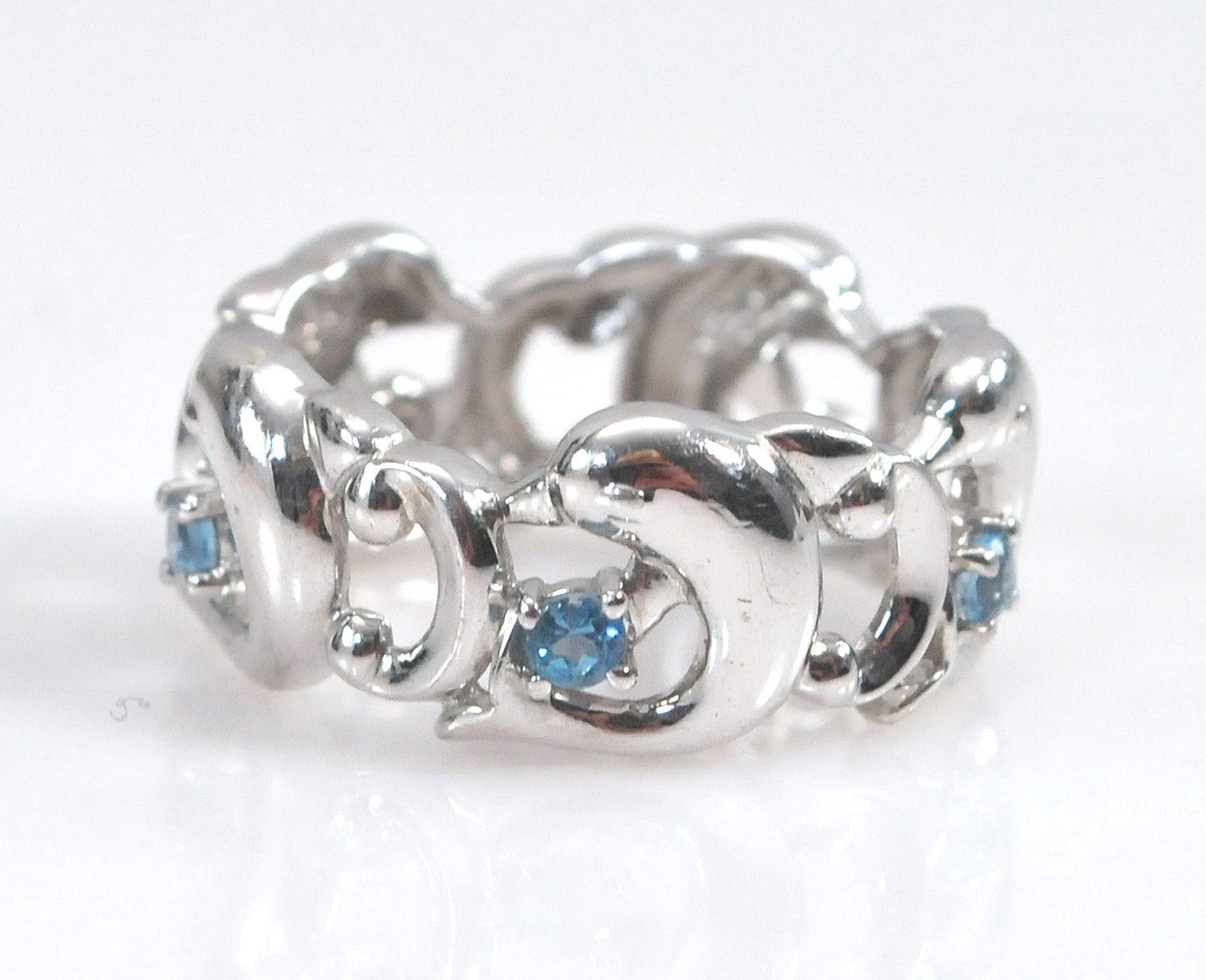 Concorde Collection Sterling Silver Blue Topaz Dolphin Ring