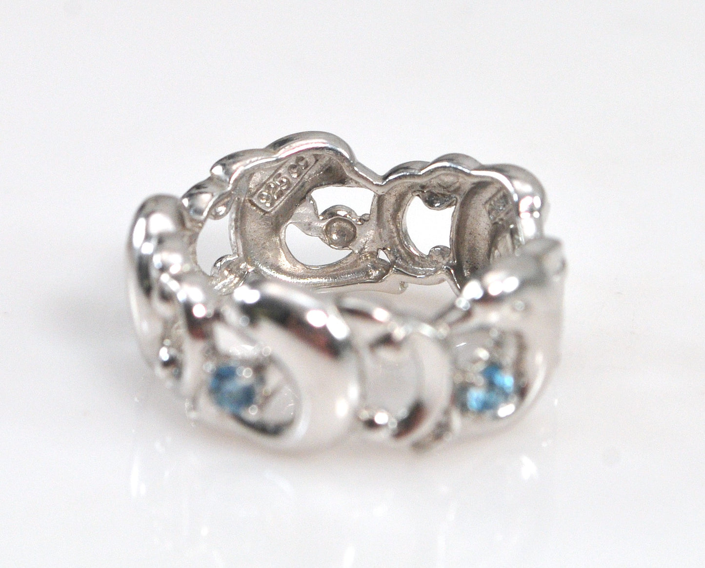 Concorde Collection Sterling Silver Blue Topaz Dolphin Ring