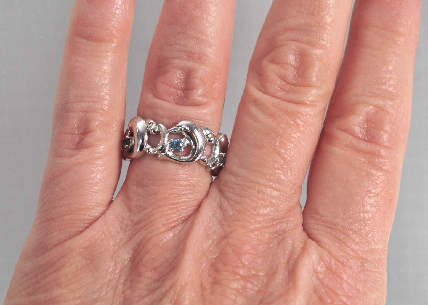 Concorde Collection Sterling Silver Blue Topaz Dolphin Ring